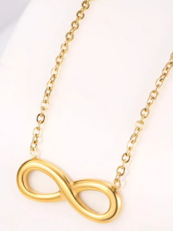 Золотое ожерелье с подвеской бесконечности Золотое ожерелье с подвеской бесконечности